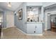 Inviting entryway featuring neutral tile floors and a seamless view into the adjacent kitchen space at 8952 W Monte Vista Rd, Phoenix, AZ 85037
