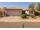 Charming single-story home featuring a tile roof, a two-car garage, and easy-care landscaping at 8952 W Monte Vista Rd, Phoenix, AZ 85037