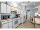 Well-lit kitchen featuring essential appliances and ample counter space for meal preparation at 8952 W Monte Vista Rd, Phoenix, AZ 85037