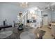 Open-concept kitchen and dining area, filled with natural light and featuring modern décor at 8952 W Monte Vista Rd, Phoenix, AZ 85037