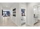 Bright hallway with a view to the open living area, bedroom and bathroom at 9943 S Desert View Dr, Apache Junction, AZ 85120