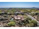 Desert community featuring lush landscaping, beautiful homes, and proximity to a golf course at 10531 E Cinder Cone Trl, Scottsdale, AZ 85262