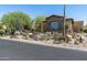 Charming desert home with stone accents, a tile roof, desert landscaping, and privacy at 10531 E Cinder Cone Trl, Scottsdale, AZ 85262