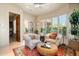 Sitting room with bay window and plush seating at 10531 E Cinder Cone Trl, Scottsdale, AZ 85262