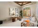 Cozy sitting room featuring comfortable seating, natural light, and tasteful decor provides a relaxing retreat at 10531 E Cinder Cone Trl, Scottsdale, AZ 85262