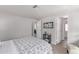 Comfortable bedroom boasts neutral walls, carpet, and convenient closet and bathroom access at 11000 N 91St Ave # 101, Peoria, AZ 85345