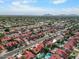 View of a home with a private pool in a community with mountain views at 11106 E Clinton St, Scottsdale, AZ 85259