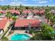 Home with a private backyard pool, covered patio and desert landscaping at 11106 E Clinton St, Scottsdale, AZ 85259