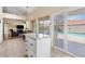 Eat-in kitchen with granite countertops, stainless appliances and view of the pool at 11106 E Clinton St, Scottsdale, AZ 85259