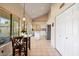 Spacious eat-in kitchen with stainless appliances, granite countertops and tiled flooring at 11106 E Clinton St, Scottsdale, AZ 85259