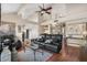 Spacious living room featuring vaulted ceilings, ceiling fan and stylish decor at 11106 E Clinton St, Scottsdale, AZ 85259