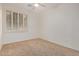 Bedroom featuring white walls and a window with shutters at 12451 W Nadine Way, Peoria, AZ 85383