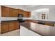 Kitchen boasting modern appliances, sleek countertops, and custom cabinetry at 12451 W Nadine Way, Peoria, AZ 85383