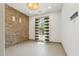 Bright bedroom with brick wall, offering lots of natural light at 15711 S 11Th Ave, Phoenix, AZ 85045