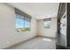 Bright, airy bonus room with large windows providing natural light, perfect for relaxation or as a multi-purpose area at 15711 S 11Th Ave, Phoenix, AZ 85045
