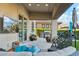 Relaxing covered patio with furniture, outdoor kitchen and grill at 15711 S 11Th Ave, Phoenix, AZ 85045