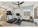 Exercise room features a ceiling fan, a beautiful view, and exercise equipment at 15711 S 11Th Ave, Phoenix, AZ 85045