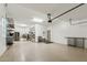Spacious three-car garage with ample storage and a clean, organized layout at 15711 S 11Th Ave, Phoenix, AZ 85045