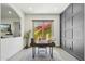 Home office featuring designer wall, a modern desk, and a peaceful garden view at 15711 S 11Th Ave, Phoenix, AZ 85045