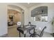 Cozy home office with modern decor and seamless access to dining and Gathering space at 15711 S 11Th Ave, Phoenix, AZ 85045
