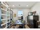 Bright office with built in storage, sleek desk, and a beautiful view at 15711 S 11Th Ave, Phoenix, AZ 85045
