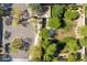 Bird's eye view of a community park with walking paths and playground amidst lush greenery at 15711 S 11Th Ave, Phoenix, AZ 85045
