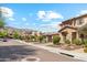 Charming street showcasing well-maintained homes with mature trees and landscaping at 15711 S 11Th Ave, Phoenix, AZ 85045