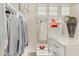 Organized walk-in closet with shelving and drawers, showcasing the storage capacity and design with accent lighting features at 15711 S 11Th Ave, Phoenix, AZ 85045