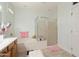 Clean bathroom with a separate shower, soaking tub and white vanity at 16158 W Copper Point Ln, Surprise, AZ 85374