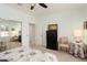 Cozy bedroom with carpet, a dresser, and a mirrored closet at 16158 W Copper Point Ln, Surprise, AZ 85374