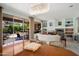 Elegant dining area with a view of the backyard, showcasing seamless indoor-outdoor living at 16158 W Copper Point Ln, Surprise, AZ 85374