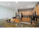 Spacious kitchen showcasing granite countertops, modern appliances, and plenty of storage space at 16158 W Copper Point Ln, Surprise, AZ 85374