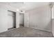 Second bedroom is bright and features carpet flooring, with a large closet at 1634 E Donner Dr, Tempe, AZ 85282