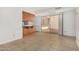 Open dining area offers tile floors, wooden breakfast bar, and a sliding door to the patio at 1634 E Donner Dr, Tempe, AZ 85282