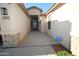 Welcoming walkway to front door featuring an address on the side of the house at 17516 W Pershing St, Surprise, AZ 85388