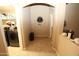 Spacious laundry room featuring tile floors and a washer and dryer at 17516 W Pershing St, Surprise, AZ 85388