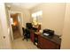 Home office with built-in desk and cabinets, offering a functional workspace at 17516 W Pershing St, Surprise, AZ 85388