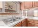 A kitchen featuring stainless steel appliances and an undermount double-basin sink at 18814 N 33Rd Ave, Phoenix, AZ 85027