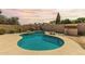 Sparkling in-ground pool surrounded by lounge space, ideal for outdoor enjoyment and relaxation at 18814 N 33Rd Ave, Phoenix, AZ 85027