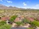 Community aerial view showcasing the homes, desert landscaping, and mountain views at 19829 N 97Th St, Scottsdale, AZ 85255