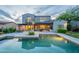 Backyard features sparkling pool, beautiful landscaping, a covered patio, and amazing mountain views at 19829 N 97Th St, Scottsdale, AZ 85255