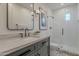 Elegant bathroom featuring a sleek vanity, modern fixtures, and a stylish walk-in shower at 19829 N 97Th St, Scottsdale, AZ 85255