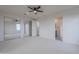 Bright bedroom with mirrored closet doors and an ensuite bathroom at 19829 N 97Th St, Scottsdale, AZ 85255