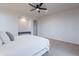 Neutral toned main bedroom with carpet flooring and simple decor at 19829 N 97Th St, Scottsdale, AZ 85255