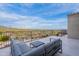 Outdoor patio offering spectacular desert and mountain views for seamless indoor/outdoor living at 19829 N 97Th St, Scottsdale, AZ 85255