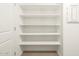 Pantry featuring multiple shelves, offering ample storage space for kitchen essentials and organization at 20795 N Roadrunner Ln, Maricopa, AZ 85138