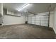 Spacious two car garage with overhead storage and direct access to the house at 22755 W Yavapai St, Buckeye, AZ 85326
