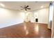 Spacious main bedroom with wood-look floors, ceiling fan, and neutral walls at 22755 W Yavapai St, Buckeye, AZ 85326