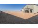 Expansive backyard perfect for creating your own desert oasis; with covered patio on the home at 22962 N 182Nd Ln, Surprise, AZ 85387