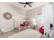 Bright bedroom with plush decor, a canopy bed, and soft natural light at 22962 N 182Nd Ln, Surprise, AZ 85387
